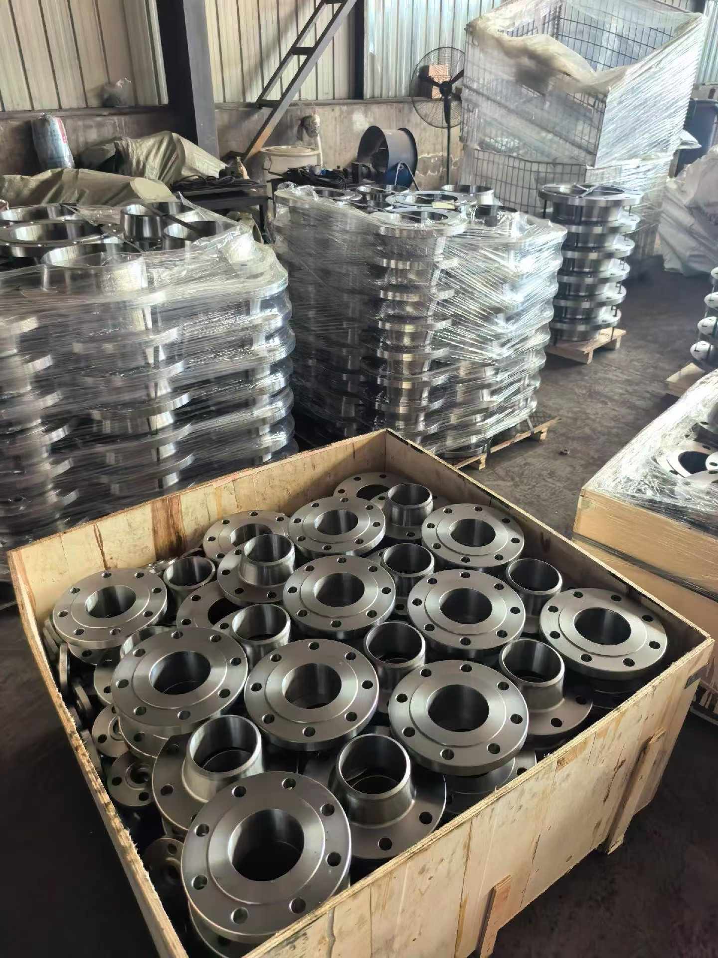 Weld neck flanges packed in wooden crate for shipment